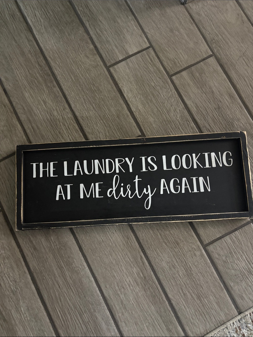 Black "The Laundry Is Looking At Me Dirty Again" Wall Sign - Rustic Home Accents